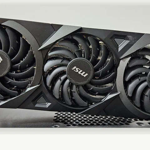 Triple-fan graphics card used as a representative photo for a 1080p GPU buying guide.