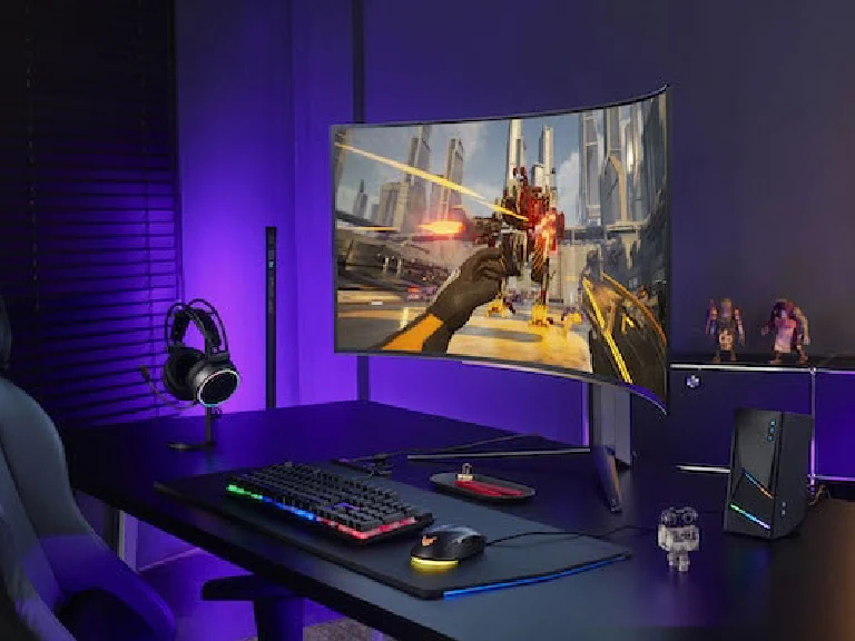 A side-by-side comparison of an OLED monitor showing perfect blacks and a Mini LED monitor with vibrant HDR highlights.