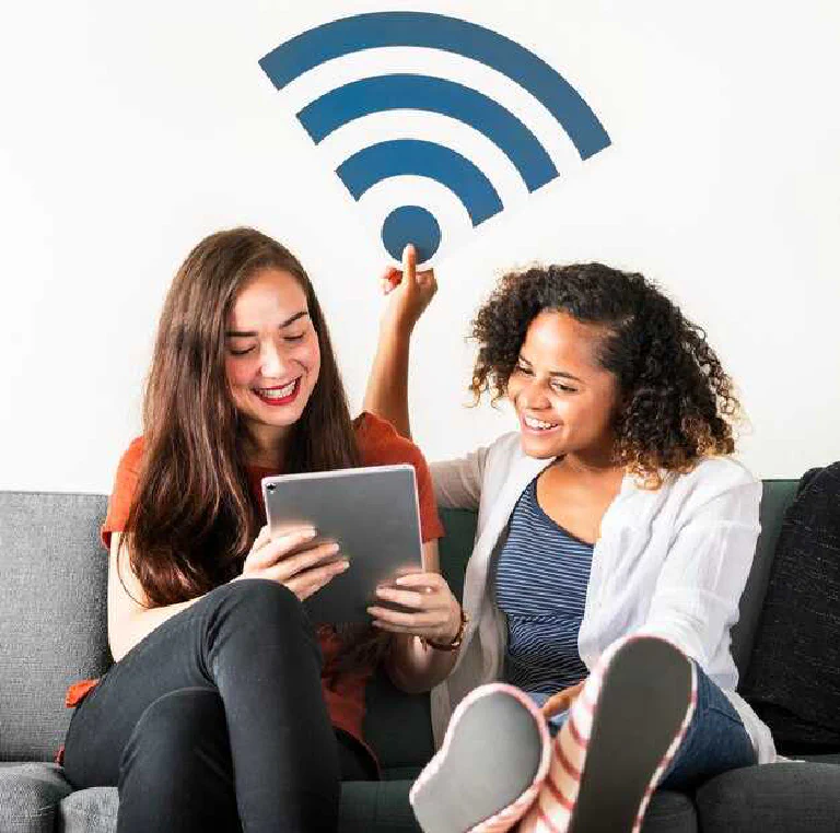 A person thoughtfully considering their Wi-Fi setup, with a mesh node, a router, and a repeater shown as options.