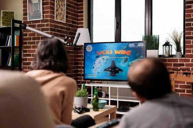 A modern living room with a Smart TV displaying a vibrant home screen.