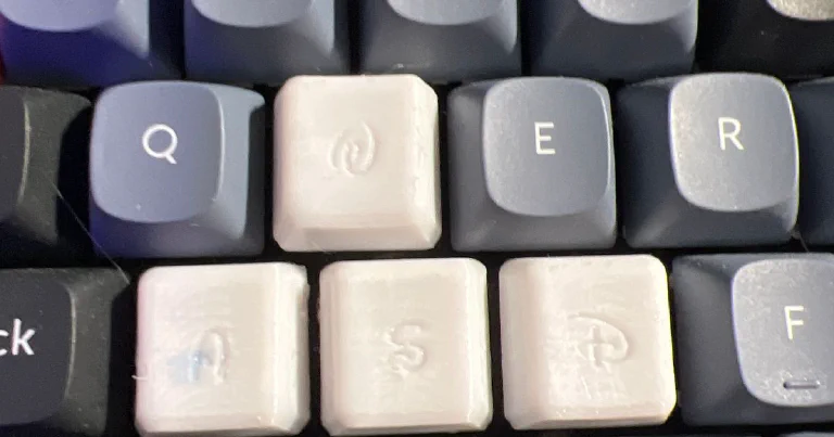 A stunning custom mechanical keyboard with artistic keycaps, glowing softly on a clean desk.