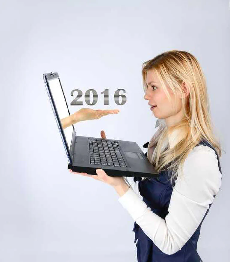 A sleek, modern ultrabook open on a minimalist desk, displaying a vibrant screen.